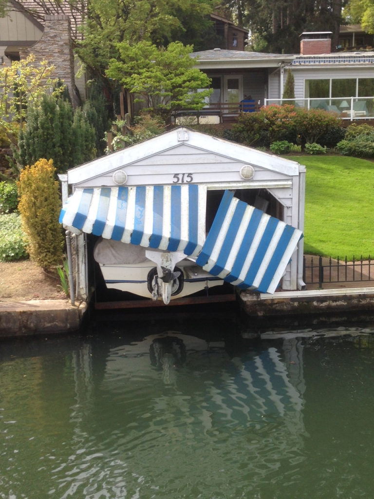 Image of a blue striped collapsed awning